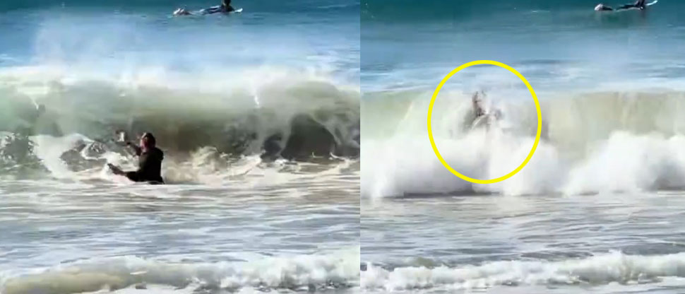 Hombre se mete al mar para salvar su dron y es embestido por una ola