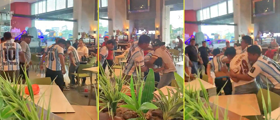 Aficionados se agarran en pleno centro comercial tras finalizar el partido entre Argentina y España