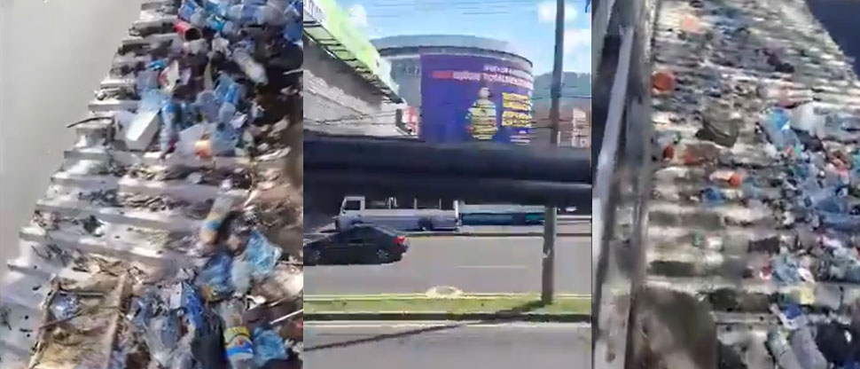 Ciudadanos de Soyapango convierten en basurero la pasarela de centro comercial