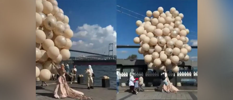 Novia casi sale volando por culpa de globos en Estambul
